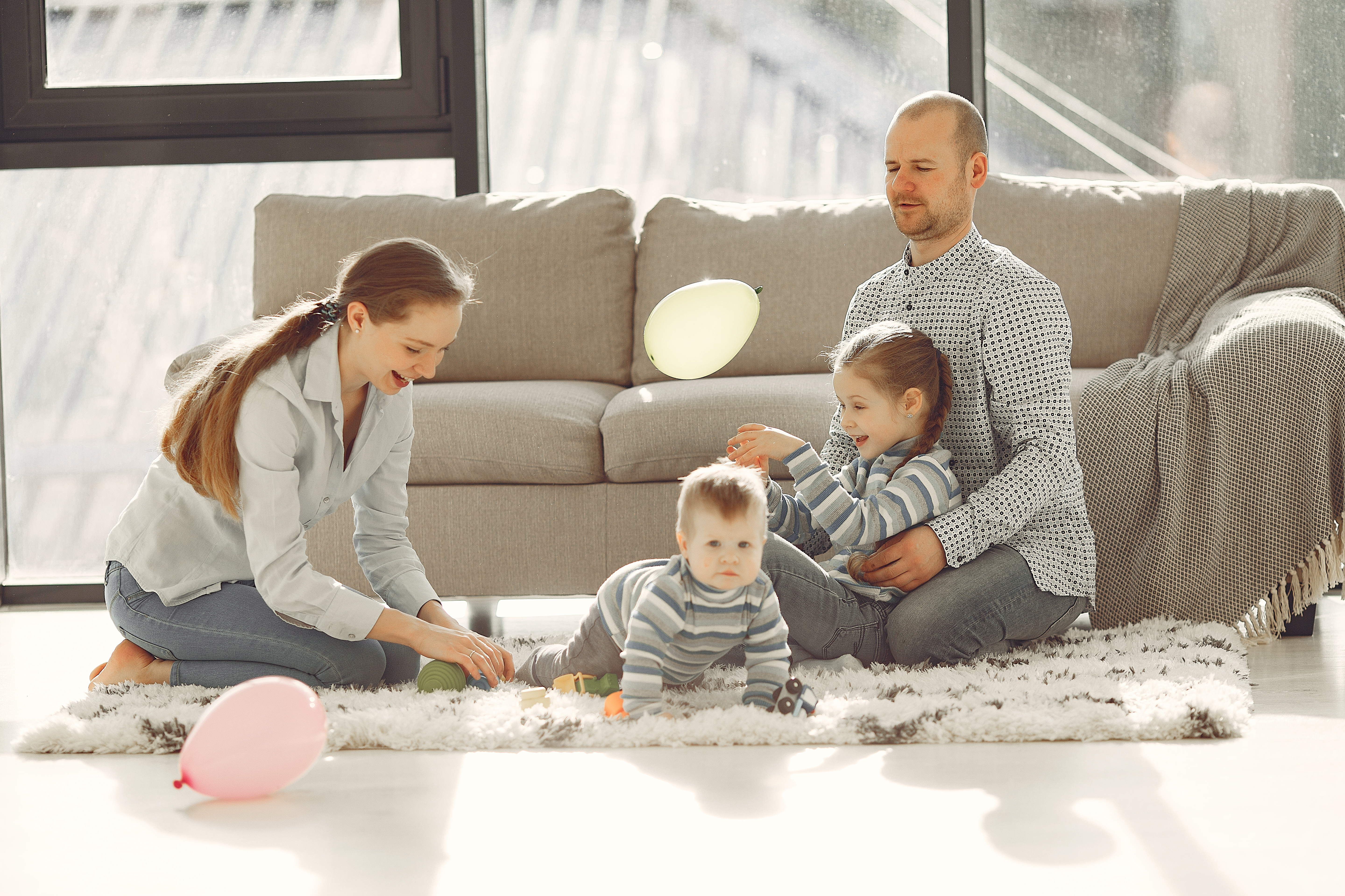 beautiful-family-spend-time-bedroom.jpg